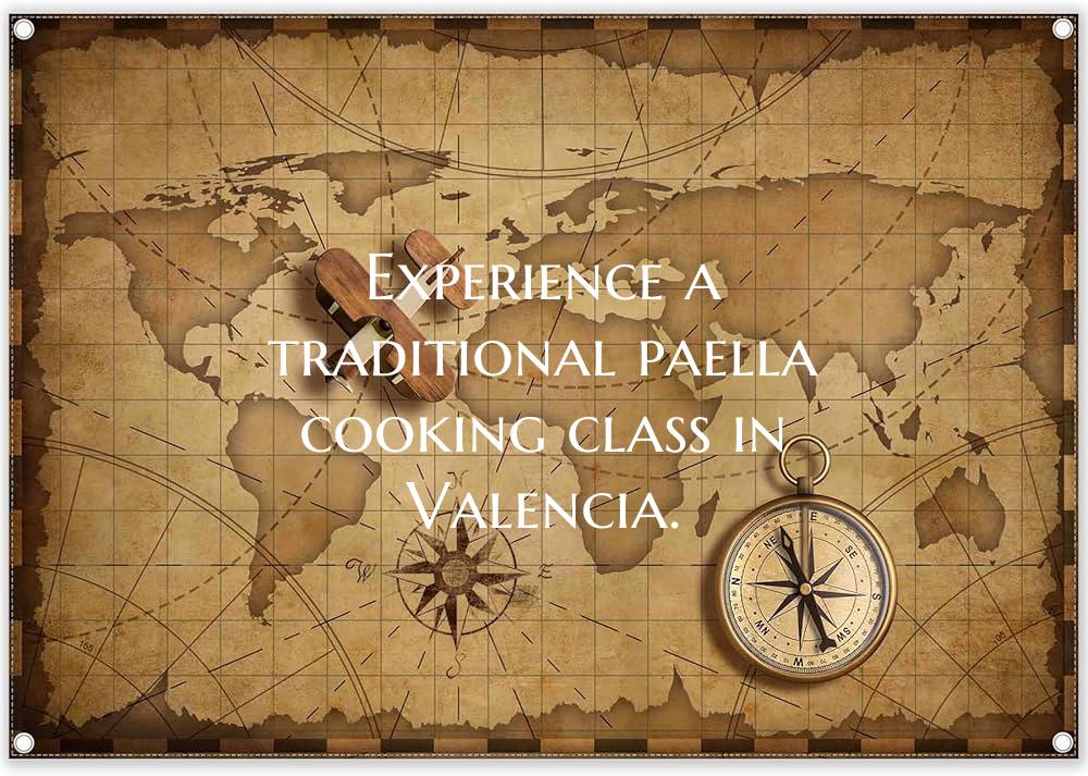 Experience a traditional paella cooking class in V...